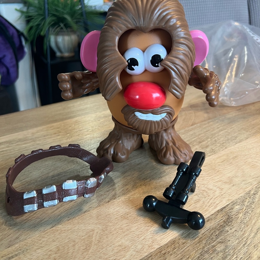 Brown Plush-Style Figure with Pink Ears and Red Nose